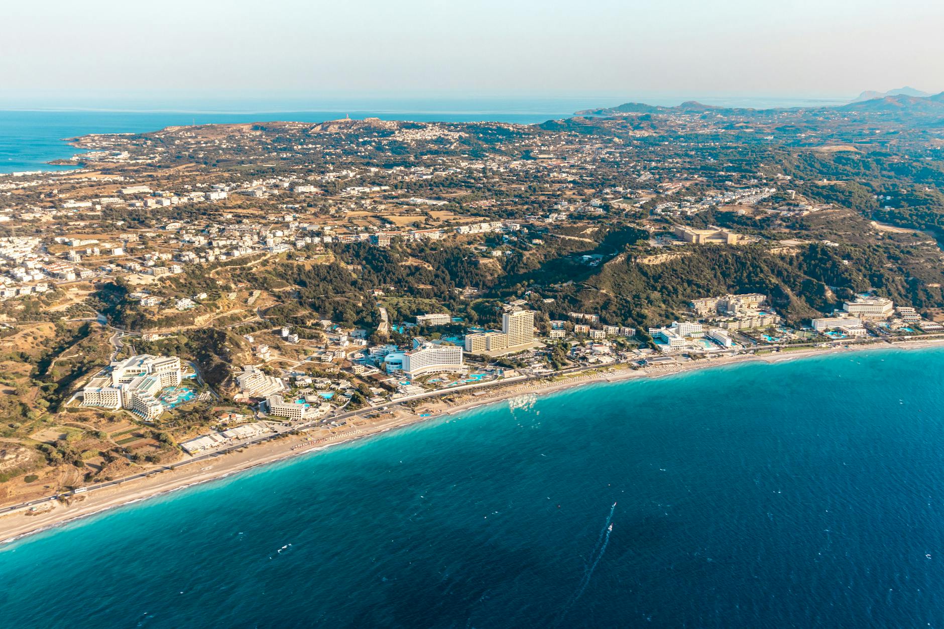 an aerial shot of a coastal city